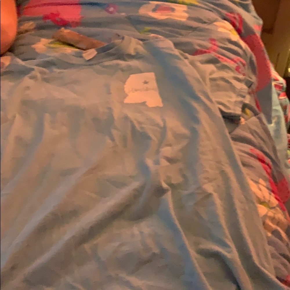 A blue tee shirt